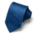 Detailed shot of a stylish blue jacquard tie with elegant leaf pattern and rolled design. - Blue
