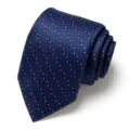Close-up detail of navy blue men's jacquard polka dot tie, perfect for business and weddings. - Dark Blue