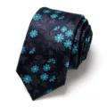 Detailed view of the elegant men's jacquard patterned necktie showing fine floral texture. - Dark Blue