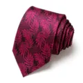 Elegant mens purple jacquard necktie detail, classic leaf pattern for formal business wear. - Dark Purple Red