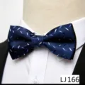 Close-up detail of dark blue jacquard bow tie with subtle pattern, formal menswear accessory. - Geometric Dot Style(12638-LJ166) / Dark Blue