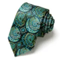 Men's woven jacquard necktie featuring a paisley and dot pattern in dark green and turquoise. - Dark Green