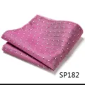 Close-up detail of a pink pocket square featuring fine geometric dot patterns and neat stitched edges. - Small Dot Jacquard (SP182)
