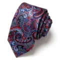 Detailed view of mens formal tie with red blue jacquard paisley pattern for business wear. - Multicolor