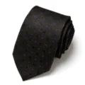 Close-up detail of dark mens jacquard tie featuring blue polka dots, rolled elegant style. - Dark Color