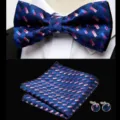 Detail shot of blue jacquard bow tie, pocket square, and cufflinks for suit accessories. - JP172