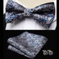Detailed close-up view of blue floral jacquard bow tie, pocket square and cufflink set. - JP188 Blue Floral Jacquard