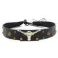 Close up view of the black leather hat band featuring a metallic silver bull head and studs. - Size 7
