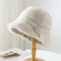 Cozy plush bucket hat detail showcasing soft faux fur texture and stylish winter design. - One Size / Gray