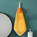 Cute coral fleece hanging hand towel with plush carrot toy for kitchen bathroom use. - 30*30cm / Yellow