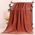 Brown microfiber oversized bath towel, thick absorbent towel for salon bed, solid color textile. - Coffee