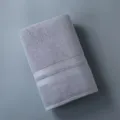 Soft thick cotton bath towel in solid grey color, highly absorbent and comfortable for daily use. - 34*74 Towel / Gray