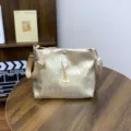 Fashionable metallic gold quilted shoulder bag for women with elegant pearl cat charm and strap. - Cat Head Gold