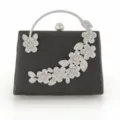 Elegante schwarze Abendtasche mit glitzernden Strassblumen und silbernem Metallgriff. - 2307 Schwarz