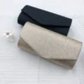Glitzernde Abendtasche, elegante schwarze und goldene Clutch für festliche Anlässe. - Champagner