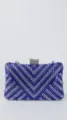 Stunning blue crystal evening clutch bag detail showing sparkling rhinestones and metal clasp. - Blue