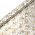 Close-up detail of decorative wrapping paper roll with elegant gold and silver feather pattern. - Gold & Silver Pattern