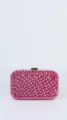 Pink rhinestone clutch bag detail, sparkling crystals in wave pattern with gold clasp. - Rose Red