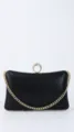 Black rhinestone evening clutch bag with gold chain strap and stylish ring clasp design. - Black