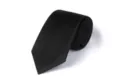 Close up detail of the black woven necktie texture, showing fine diagonal lines clearly. - L7008 (Black Twill)