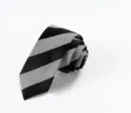 Close-up detail of classic black and white striped men necktie, elegant formal business style. - L7014-1 (Classic Black and White Striped)