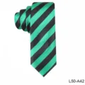 Close-up detail of a stylish green and black striped narrow necktie, elegant fabric texture. - L50-A42