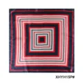 Detailed shot of a geometric square silk scarf with red, black, and white patterns. - Black Red White Geometric Square