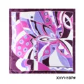 Detailed view of fashionable women square silk scarf with geometric abstract floral print in purple. - Geometric Abstract Floral