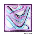 Close-up detail of women's silk square scarf featuring vibrant geometric wave print. - Colorful Geometric Wave Purple Border