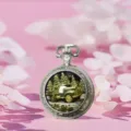 Vintage quartz pocket watch with truck pattern, silver metal case and retro necklace design. - Car