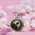 Silver vintage pocket watch with crow dial design, retro necklace pendant quartz timepiece. - Red Circle Crow