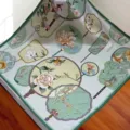 Closeup detail of green silk square scarf with exquisite traditional Chinese fan and floral pattern. - SJ1025-JKF