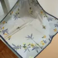 Detailed view of 55x55cm mulberry silk square scarf with elegant yellow floral and bird print. - SJ1066-JKF