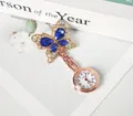 Elegante orologio da tasca per infermiera con farfalla cristallo blu oro rosa - Farfalla blu reale (cassa in oro rosa)