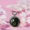Vintage silver pocket watch necklace with dragon yin yang dial design, retro quartz timepiece. - Two-Tone Dragon
