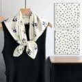 Detailed view of the mulberry silk square scarf featuring elegant blue panda prints on white. - SJ1514-JKF