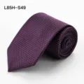 Purple silk men's tie, rolled up on white background, elegant business formal necktie style. - L85H-S49