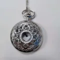 Vintage silver hollow pocket watch featuring intricate floral carved case and matching chain. - Silver Hollow Bracelet
