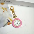 Mini orologio da tasca elegante con lunetta rosa e portachiavi dorato al quarzo. - Rosa