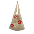 Detailaufnahme der beige Strick-Netz-Umhängetasche mit charmanten roten Blumenmustern. - Aprikose