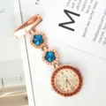 Rose gold nurse pocket watch with blue crystal plum blossom design and quartz movement dial. - Blue Rhinestones with Rose Gold Case