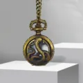 Vintage bronze snake pocket watch, hollow carved zodiac design with chain for retro gifts. - Snake