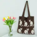 Braune Strick-Tragetasche mit niedlichen weißen Katzenmustern, lässige Schultertasche. - Kaffeebraun