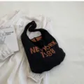 Schwarze Vintage Strick Schultertasche fuer Damen mit Buchstaben Print laessige Stofftasche. - Schwarz