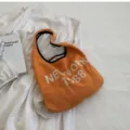 Orangene Strick-Umhängetasche für Damen, retro lässige Handtasche mit Buchstaben. - Orange