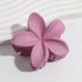 Matte pink plumeria flower hair claw clip detail shot, perfect for summer hairstyles and daily wear. - Matte Purple Pink