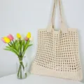 Beige geflochtene Häkel-Strick-Damentasche, lässige Schultertasche für den Alltag und Einkauf. - Aprikose