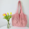 Rosa Strick Häkel-Shopper für Damen, stilvolle hohle Freizeittasche modische Umhängetasche. - Rosa