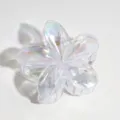 Close-up detail shot of transparent iridescent flower hair claw clip, gorgeous pearl shine. - 1 Piece / Translucent Iridescent