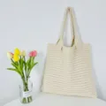Borsa shopper in maglia beige con comodi manici, borsa casual ideale per uso quotidiano. - Albicocca